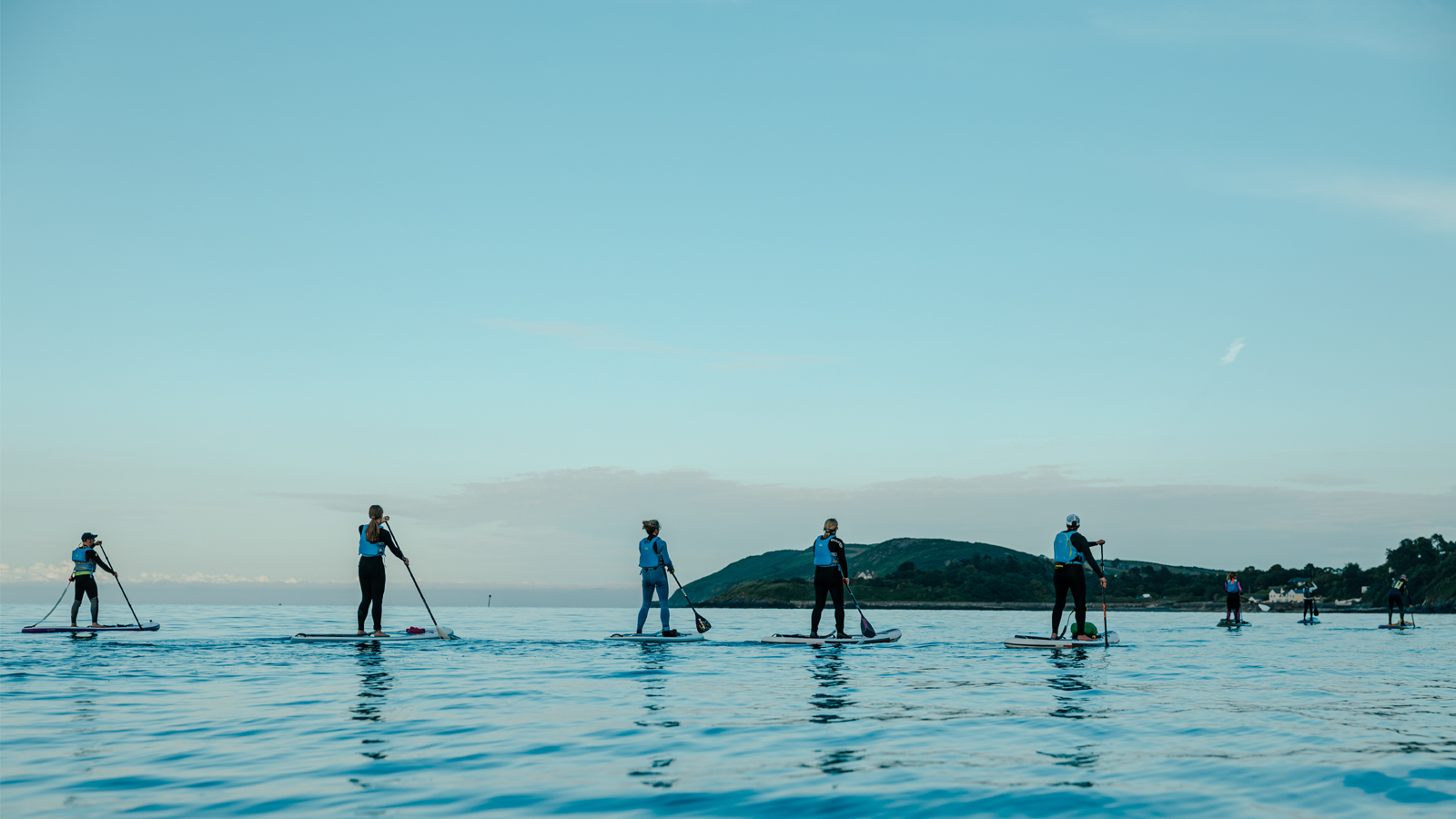 A group of paddleboarders